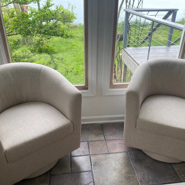 Swivel Accent Chair with Ottoman in the balcony