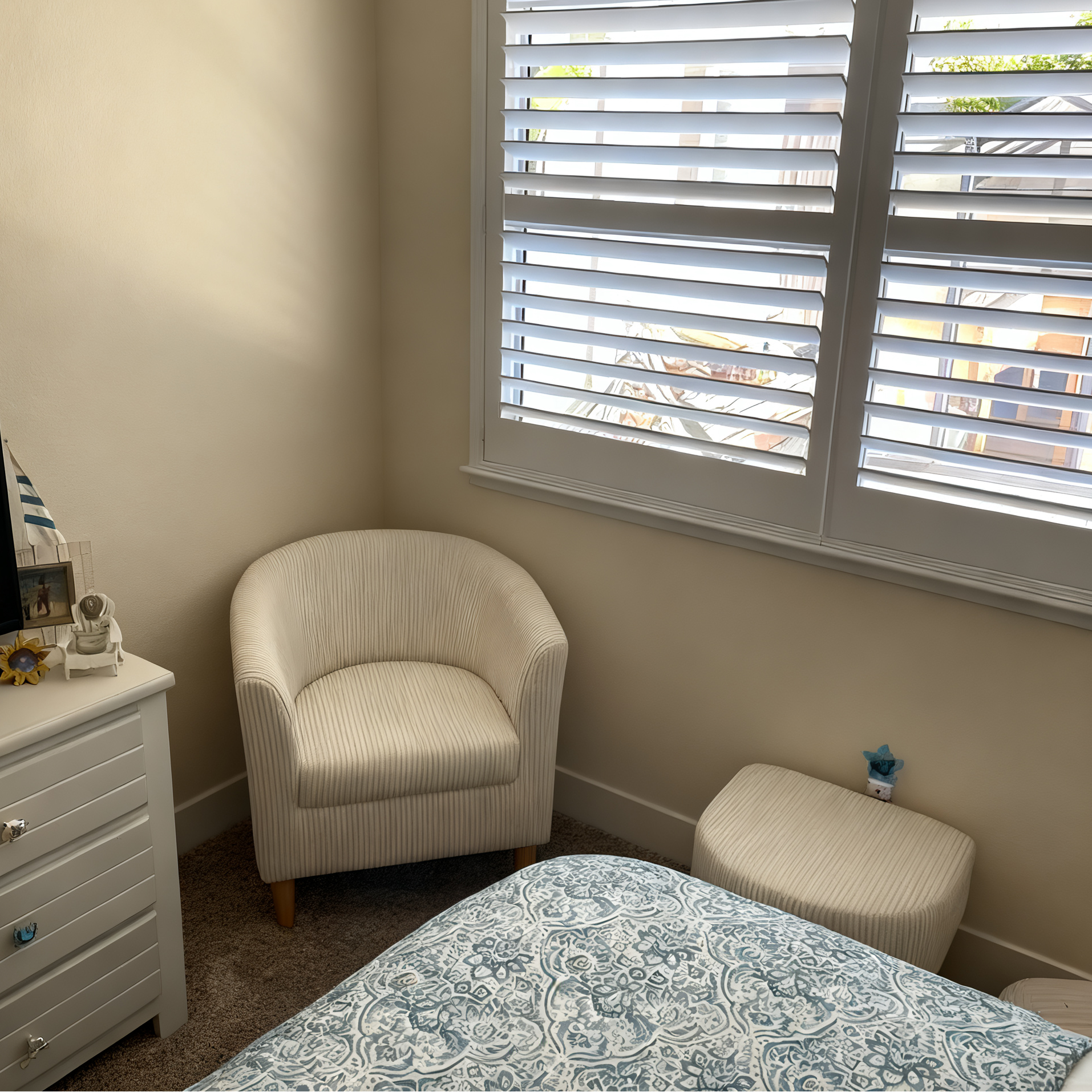 Corduroy cream sherpa accent charis with ottoman set-up in the babyroom