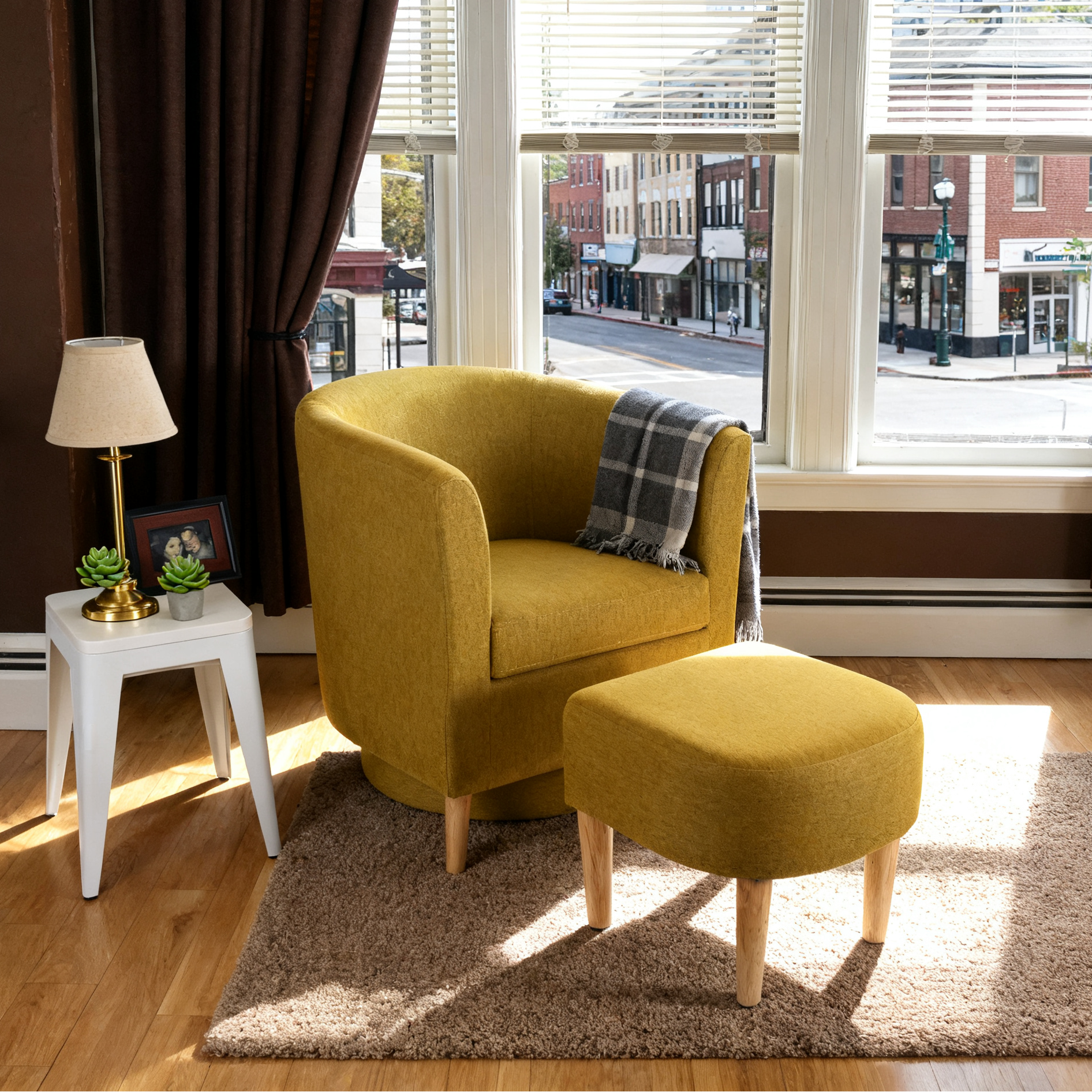 seivel accent chair placed next to the window with the street as the background