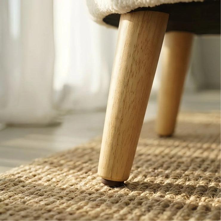 Solid wood legs detail on the sherpa accent chair